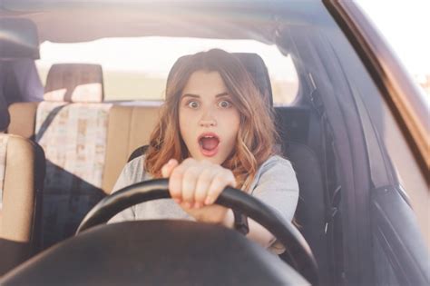 premium photo shocked beautiful european female driver realizes that her car is broken can t