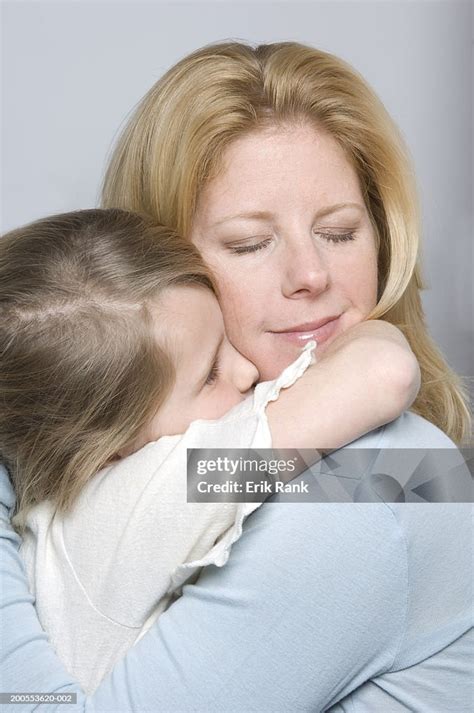 Mother And Daughter Hugging Closeup High Res Stock Photo Getty Images