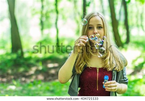 Beautiful Girl Blowing Bubbles Park Stock Photo 434721133 Shutterstock