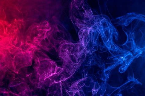 Premium Photo Colorful Red And Blue Color Smoke Isolated On Dark