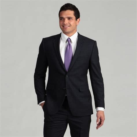 A dark suit emphasizes the shape and presence of the wearer more than a lighter color would. Adolfo Men's 2-button Navy Blue Linen Suit - Free Shipping ...