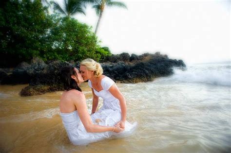 Lesbian Kiss In The Surf Marry Me Maui Wedding Planners Lesbian Beach Wedding Wedding Dress