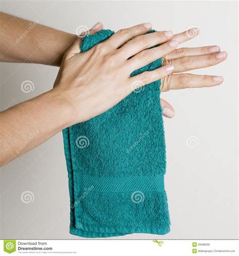 Cleaning Hands With A Towel Stock Photography Image