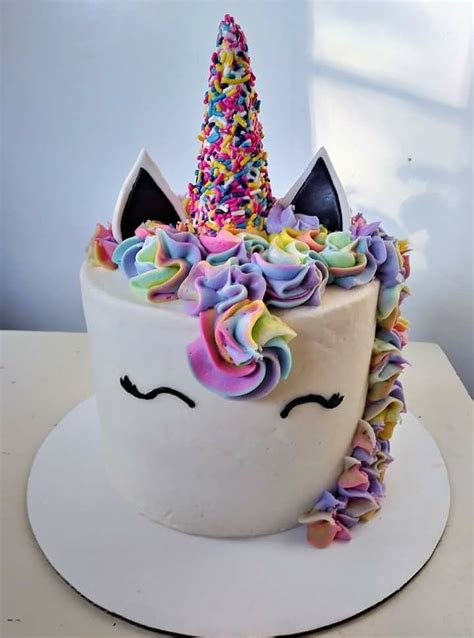 View all cake themes ». Colorful swirled unicorn cake with a sprinkled horn | Easy ...