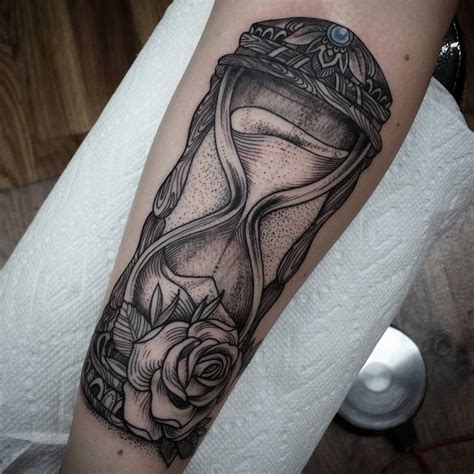 Let this tattoo remind you that time can heal all wounds and that, with the passing of time, you can overcome. hourglass (With images) | Hourglass arm tattoos, Hourglass ...