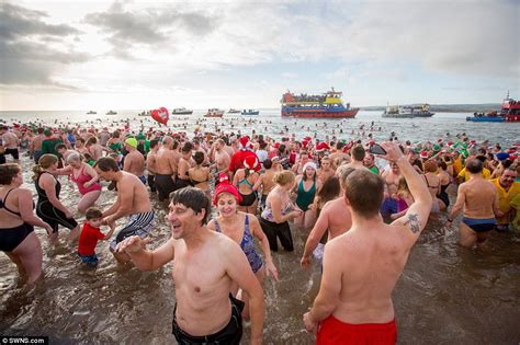 Thousands Of Swimmers Strip Off To Brave Icy Waters Around Britain For