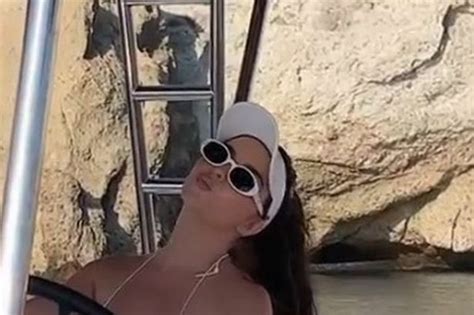Demi Rose Spills Out Of Tiniest Ever Micro Bikini As She Enjoys Wild