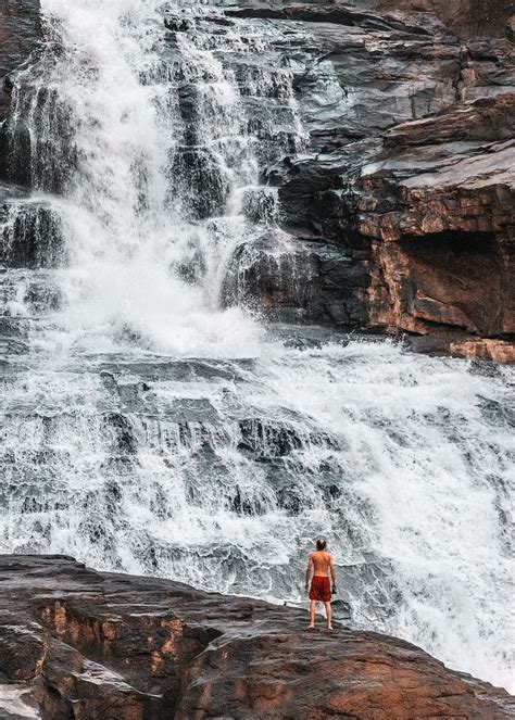 Hd Wallpaper Man Standing Infront Of Large Waterfall Motion Long