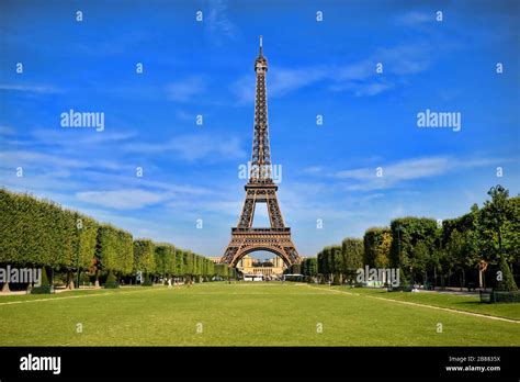 Eiffel Tower Iconic Paris Landmark With Vibrant Blue Sky France Stock