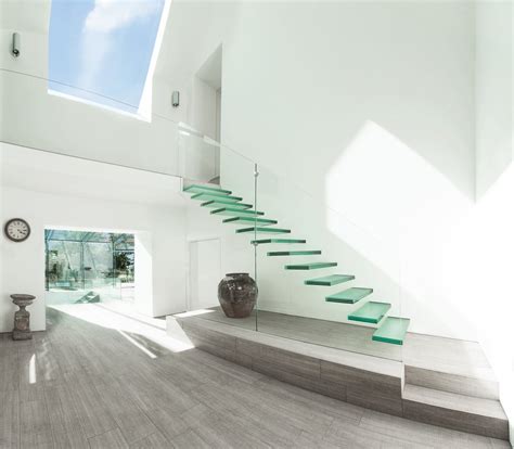 Curved glass staircases wood, glass and stainless steel and combined to achieve high performance. 20 Glass Staircase Wall Designs With A Graceful Impact On ...