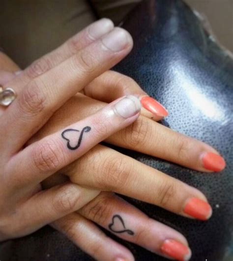 Wrist tattoos are one of the most unique. supreme Finger couples heart tattoo done at our studio ...