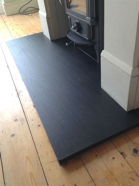 It also provides a focal point for the room. The 25+ best Slate hearth ideas on Pinterest | Log burner ...