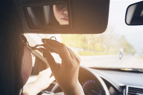 This most often happens at the corners of the eye, particularly if the curler is too long for the width of your lash line. Woman Makeup Her Face Using Eyelash Curler While Driving ...