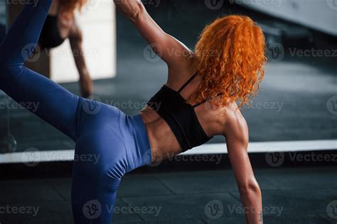 Strength And Flexibility Sporty Redhead Girl Have Fitness Day In Gym At Daytime Muscular Body