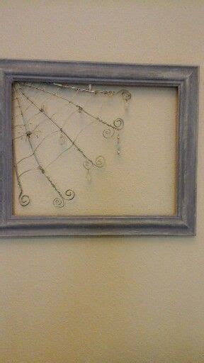 Frames, digital picture frame, admob, ads, mirrors, multi photo frames, photo editing. Wire spiders web with hanging crystals in painted picture ...