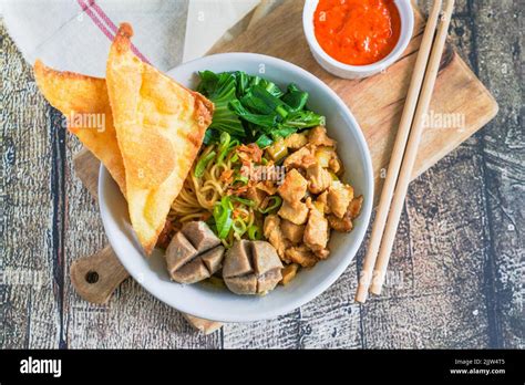 Indonesian Street Food Mie Ayam Bakso Noodles With Chicken And Served