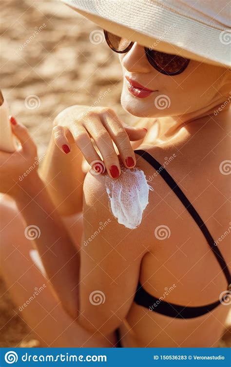 Beautiful Woman Smile Applying Sun Cream On Shoulder Skincare Body Sun Protection Sunscreen