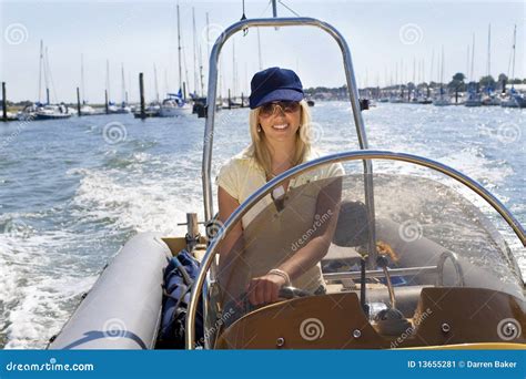 Beautiful Young Blond Woman Driving A Speedboat Stock Image Image Of