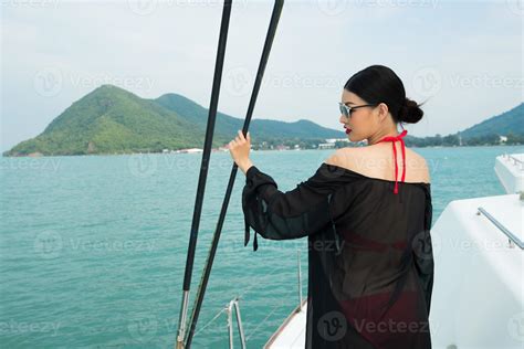 Beautiful Asian Mix Race Tanned Skin Woman Walk Along Luxury Yachts In