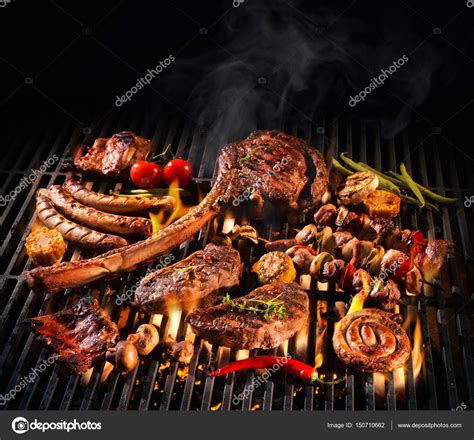 Assorted Delicious Grilled Meat On A Barbecue Stock Photo By ©alexraths