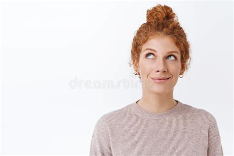 Portrait Of Dreamy Young Beautiful Girl Smiling Looking Up Thinking