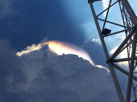 Iridescent Cumulonimbus Cloud Appears Over Singapore In Pictures