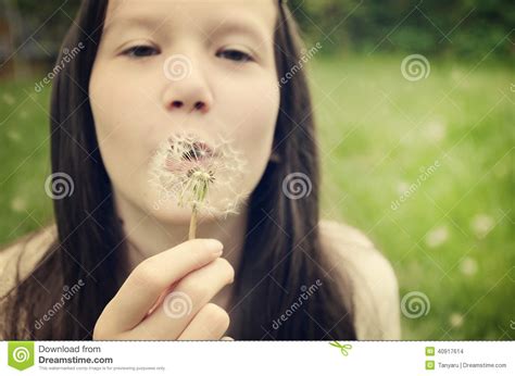 Teen Girl Blowing On A Dandelion Toning Stock Photo Image Of Outdoor