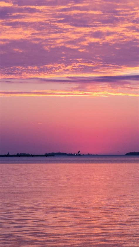Beautiful Silhouette Purple Sky Background Calm Body Of Water During