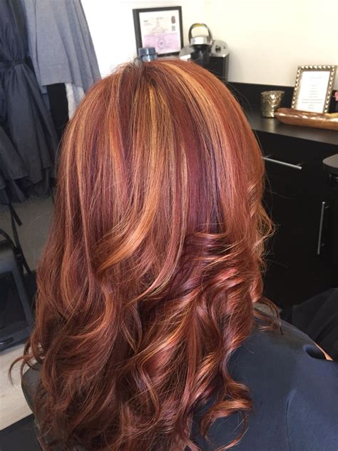 The light features with dull and energetic shade appending blonde highlights underneath natural dark hair revamps your glimpse with a great touch. Red hair with blonde highlights and violet low lights! # ...