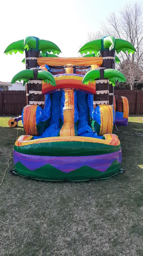 Dual Lane Tiki Tropical Bounce House And Waterslide