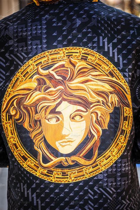 The classic versace logo consists of the head of medusa, a greek woman transformed into a monster by the. Versace logo as Medusa close-up | Versace logo, Versace, Art