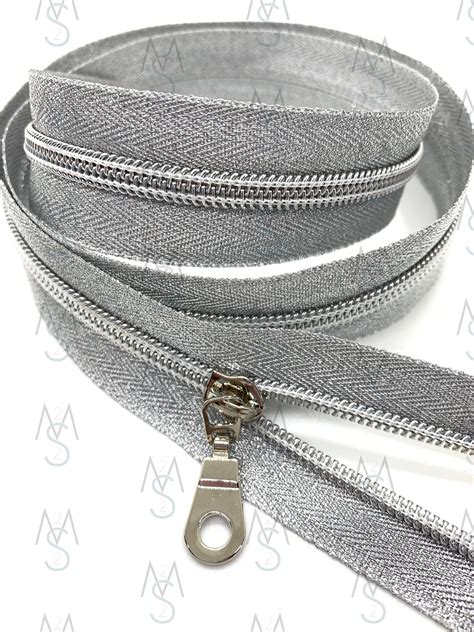 Silver Nylon Coil Zipper With Metallic Tape And Nickel Pulls Zipper By