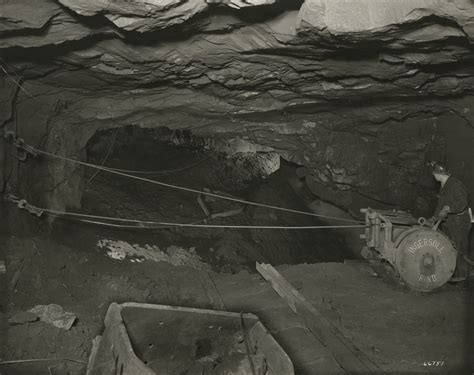 Miner Uses A Winch System Inside A Shaft In Essex County