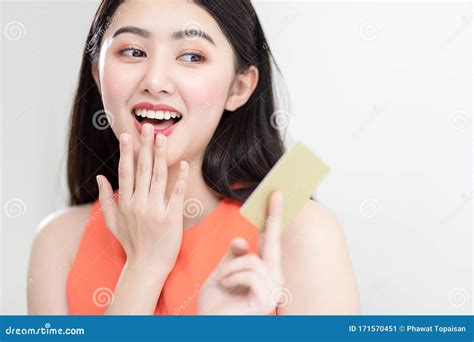Picture Showing Smart Attractive Young Asian Girl Holding Credit Card