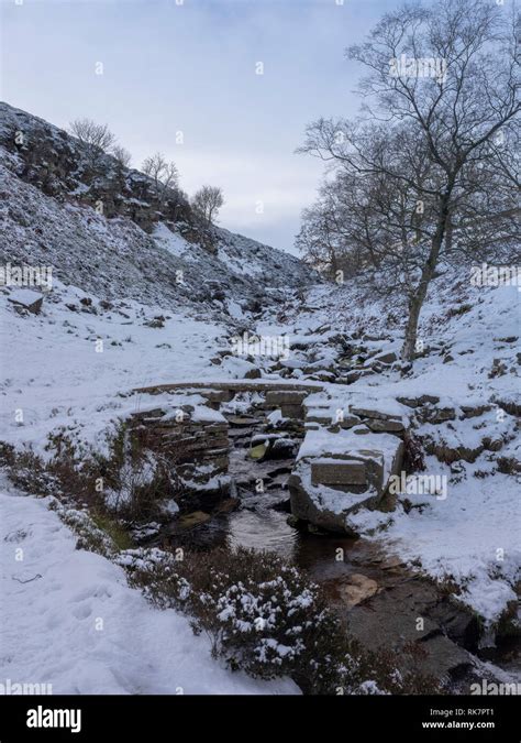 Bronte Waterfalls Near Haworth West Yorkshire In Winter With Snow