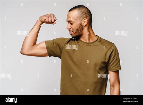Guy Flexing Muscle Hi Res Stock Photography And Images Alamy