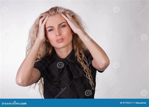 Blond Young Woman With A Pounding Headache Royalty Free Stock