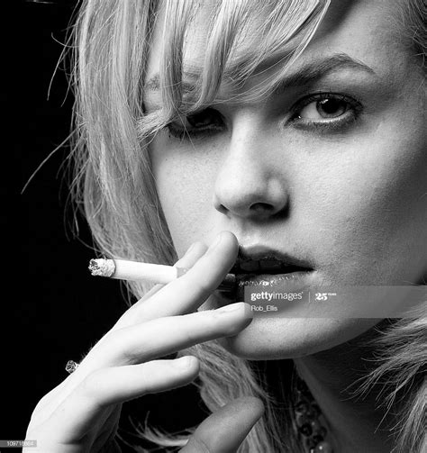 Portrait Of Young Woman Smoking Cigarette Black And White