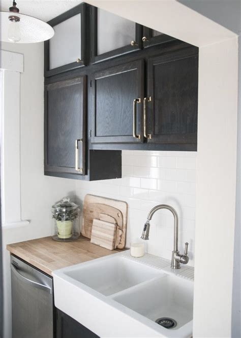 From the dishwasher to the nearest base cabinets or other obstructions should be 21 inches minimum. Sink/dishwasher - with overhead cabinets | Kitchen redesign, Kitchen remodel, Kitchen remodel ...