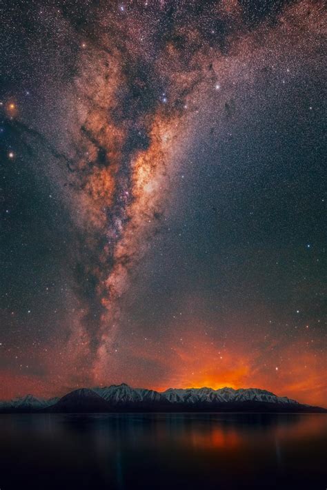 The Milky Way Burning Bright And Rising Over Lake Heron New Zealand