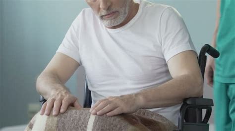 Not moving or the brace immobilized my elbow while the injury healed. Eldercare Stock Videos, Royalty Free Eldercare Footages | Depositphotos®