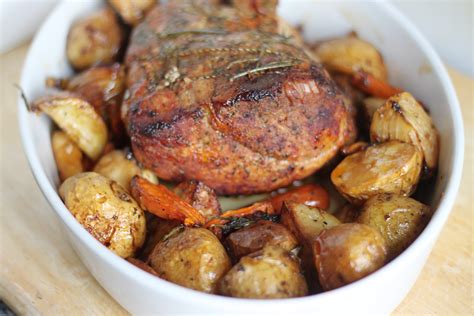 Place vegetables on bottom of a shallow roasting pan. bone in pork roast recipe food network