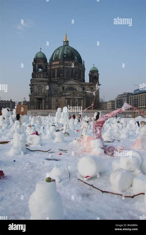 Germany Winter Berlin Snow Cathedral Dome Snowmen Figures Stock Photo