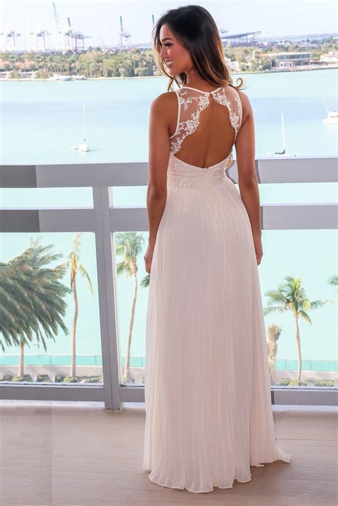 beige pleated maxi dress with embroidered top maxi dresses saved by the dress