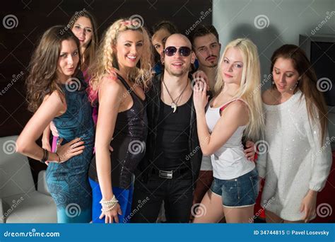 Two Men And Girls Have Fun At Party Stock Image Image Of Modern Fang