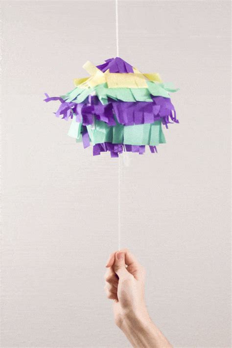 In addition to trying to relieve stress when breaking the pinata, adults are also entitled to push each other about like when they were children to get some of its precious contents. DIY Piñata Party Invitation! | Pizzazzerie