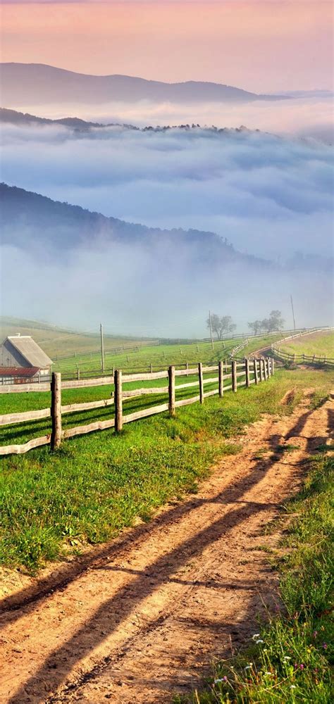 Scenery Roads Grass Fence Clouds Nature Wallpaper 720x1520