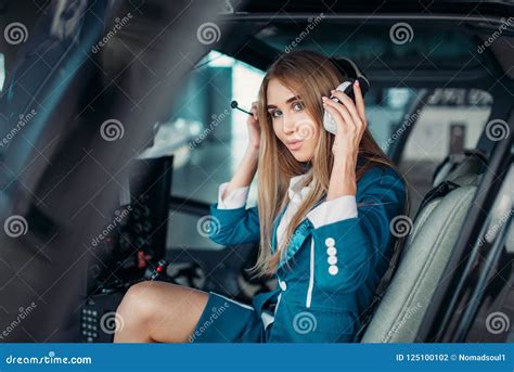 Female Pilot In Headphones In Helicopter Cabin Stock Photo Image Of
