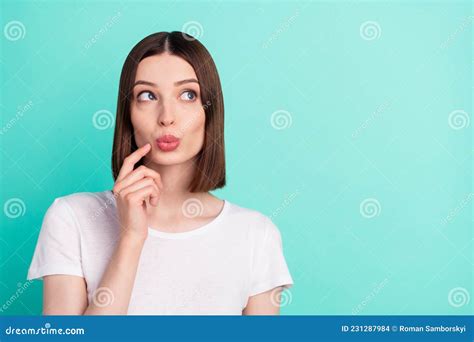 portrait of attractive cheerful curious girl fantasizing copy space isolated over bright teal
