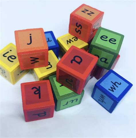 Phonics Dice Game Coloured Dice With Letters On Early Years